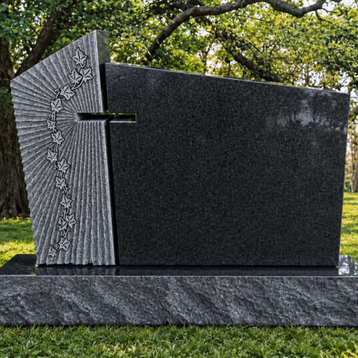 Black Granite Contemporary Monument with Carved Rose Vine Panel Black granite contemporary monument with a carved gray panel of rose vines and a cross cut-out